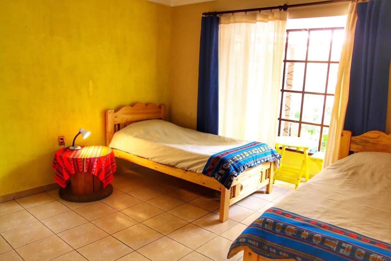 Jaguar House Hostel โกชาบัมบา ภายนอก รูปภาพ